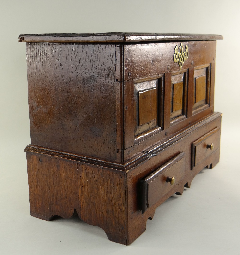 ANTIQUE OAK COFFER BACH, moulded hinged top above triple panelled front, a pierced brass - Image 3 of 7