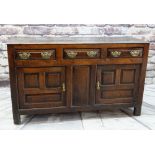18TH CENTURY JOINED OAK WELSH DRESSER BASE, North Wales, boarded top above three frieze drawers