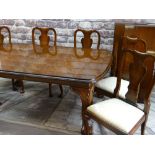 GOOD REPRODUCTION MAHOGANY EXTENDING DINING TABLE & CHAIRS, the table with moulded top on shell