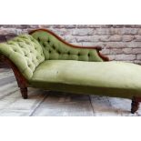 VICTORIAN WALNUT CHAISE LONGUE with button upholstered scrolled back and sides, tablet carved