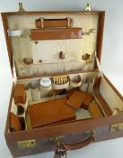 VINTAGE PIGSKIN GENTLEMAN'S VANITY CASE, ribbed cloth interior fitted with compartments for toilette