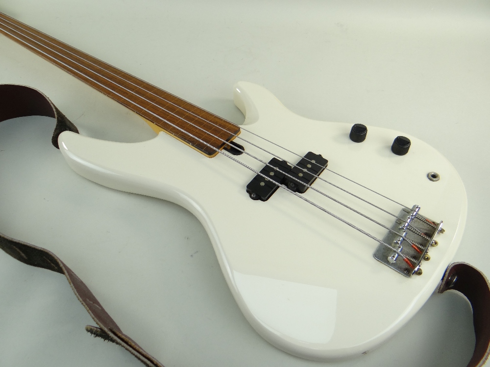 YAMAHA FRETLESS BASS GUITAR, model RBX250F, off-white finish with inlaid line fretboard, 113cms long - Image 2 of 5