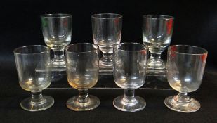 SEVEN ASSORTED VICTORIAN CLEAR GLASS RUMMERS, 13.5cms high (14)