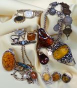 ASSORTED JEWELLERY comprising various amber jewellery including bangle, brooches, rings and