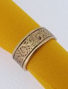 22CT GOLD RING, scroll and florally engraved, ring size O, 9gms