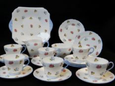 SHELLEY FINE BONE CHINA TEASET FOR SIX, decorated with roses, pansies and forget-me-knots within