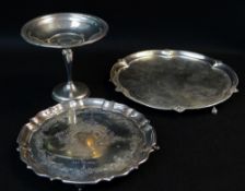 GEORGE V SILVER SALVER raised on four feet, pie crust border, scroll and florally engraved with