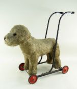 BBC BARGAIN HUNT LOT: VINTAGE MERRYTHOUGHT GREY PUSH ALONG DOG, on original painted metal frame,