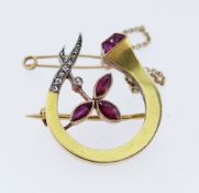 YELLOW METAL DIAMOND & RUBY NATURALISTIC BAR BROOCH, 5.1gms