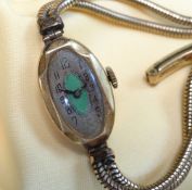 18CT GOLD LADIES WRISTWATCH, oval green guilloche enamel art deco dial engraved to reverse 'Daphne C