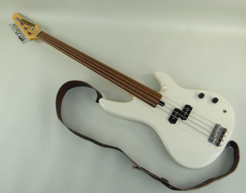 YAMAHA FRETLESS BASS GUITAR, model RBX250F, off-white finish with inlaid line fretboard, 113cms long - Image 3 of 5