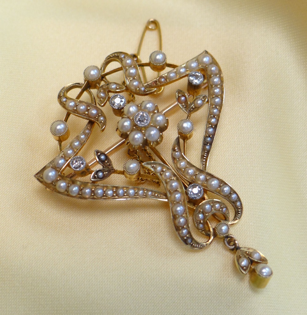15CT GOLD DIAMOND & SEED PEARL BAR BROOCH, of leaf and floral design, 7.1gms