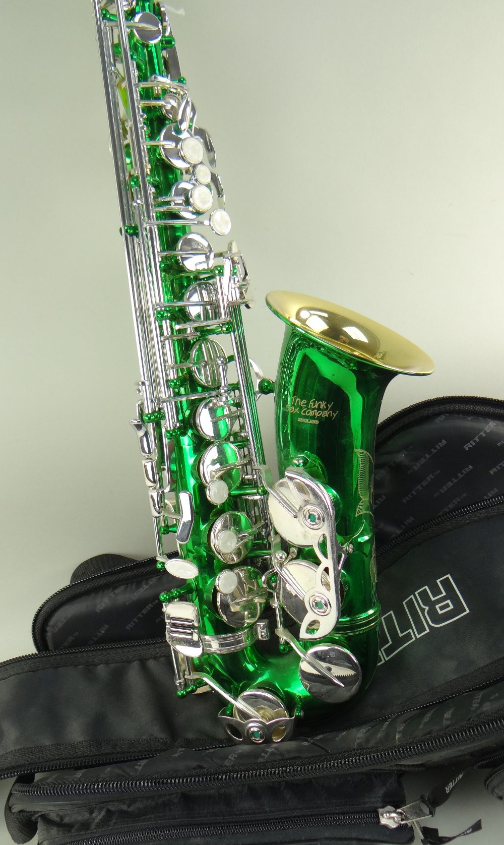 FUNKY SAX COMPANY ALTO SAXOPHONE, ser. no. N7xxx6, metallic green Condition: very good to excellent,