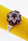 BBC BARGAIN HUNT LOT: LATE 20TH CENTURY 9CT GOLD GARNET AND DIAMOND FLORAL CLUSTER RING, 1978,