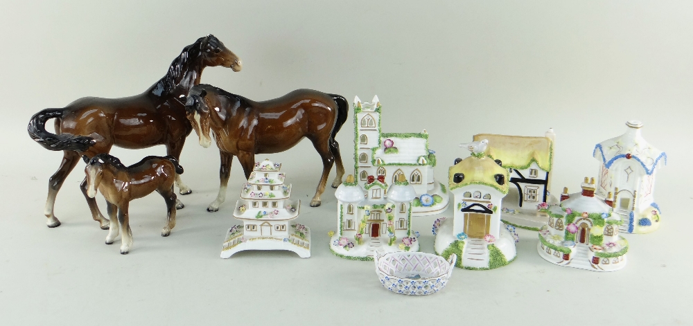 SEVEN MODERN COALPORT BONE CHINA COTTAGES & BESWICK HORSES, including 'village church', 'coaching..