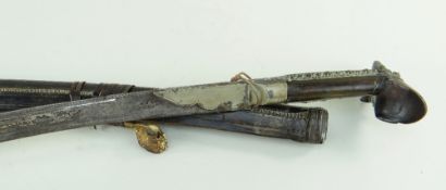 19TH CENTURY TURKISH YATAGHAN, the blade silver-damascened with foliate panels on each side, the