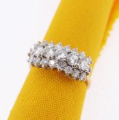 18CT GOLD TRIPLE ROW DIAMOND RING, the five primary stones totalling 0.5cts approx., 4.8gms