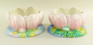 TWO CLARICE CLIFF LOTUS BULB POTS, one Newport Pottery, the other Royal Staffordshire, 13cms high