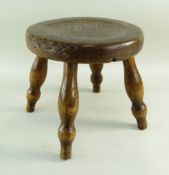 BBC BARGAIN HUNT LOT: ANTIQUE ASH & ELM 'MILKING' STOOL, dished circular seat raised on four turned