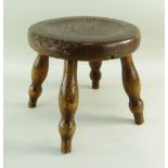 BBC BARGAIN HUNT LOT: ANTIQUE ASH & ELM 'MILKING' STOOL, dished circular seat raised on four turned