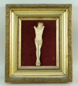 FRENCH CARVED BONE CORPUS CHRISTI, mounted in gilt gesso frame, 28 x 24cms