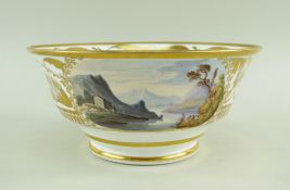 A SWANSEA PORCELAIN LANDSCAPE DECORATED TEA BOWL of footed form with flared body, London decorated