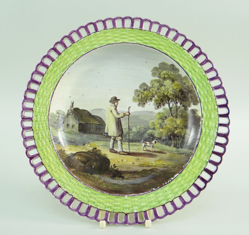 AN UNUSAL PAINTED SWANSEA WICKER BORDER PLATE circa 1820-1830 in typical lime green and purple