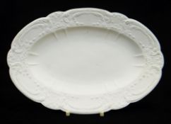 NANTGARW PORCELAIN UNGLAZED & NON DECORATED OVAL DISH typically moulded with c-scrolls, ribbons