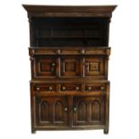 EARLY EIGHTEENTH CENTURY SNOWDONIA CWPWRDD TRIDARN the two cupboard base with arched fielded