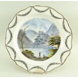 A SWANSEA POTTERY 1802-1810 PEARLWARE CHARGER DISH of lobed form, the interior painted with a