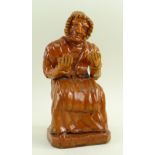 A RARE 19TH CENTURY SLIPWARE POTTERY MODEL OF AN OLD WELSH LADY IN COSTUME attributed to Pill