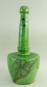 A EWENNY SLIPWARE POTTERY BOTTLE VASE BY EVAN JONES having a serrated knopped neck, green glaze with