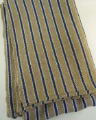 A TWO SECTION JOINED HEAVY WEIGHT ANTIQUE WELSH BLANKET having narrow blue stripes with off-white