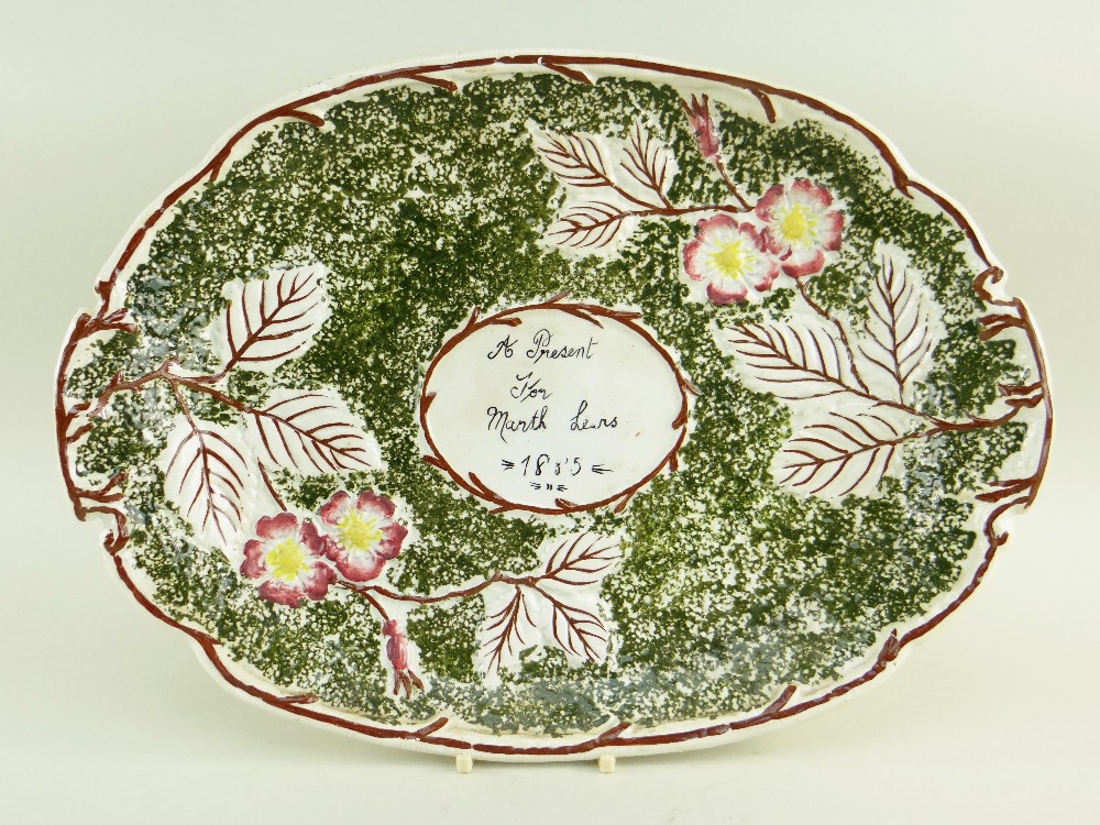 A RARE LLANELLY POTTERY BREAD PLATE WITH DEDICATION having a brown twig border extending with leaves