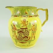 A SWANSEA EARTHENWARE CANARY YELLOW POLITICAL JUG enamel decorated with motto, crest and coat-of-
