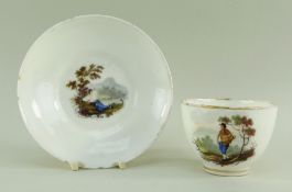 A SWANSEA GLASSY PORCELAIN CUP & SAUCER BY WILLIAM BILLINGSLEY the saucer painted with a scene of