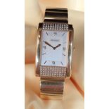 BOUCHERON 18K GOLD & DIAMOND GENTLEMAN'S 'REFLET' BRACELET WATCH, the signed, rectangular two-tone