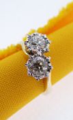 18CT GOLD TWO STONE DIAMOND RING, the two primary stones (totalling 0.7cts approximately) illusion