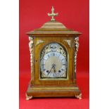 VICTORIAN GILT METAL MOUNTED OAK PAGODA TOP BRACKET CLOCK, silvered arched Roman dial with