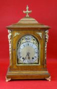 VICTORIAN GILT METAL MOUNTED OAK PAGODA TOP BRACKET CLOCK, silvered arched Roman dial with