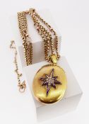 18CT GOLD LOCKET ON 9CT GOLD CHAIN, the locket decorated with enamel, seed pearl and diamond (0.