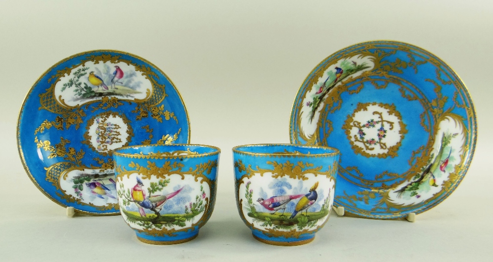 TWO SEVRES-STYLE PORCELAIN BLEU CELESTE TEA CUPS AND SAUCERS, 19th Century or later, decorated