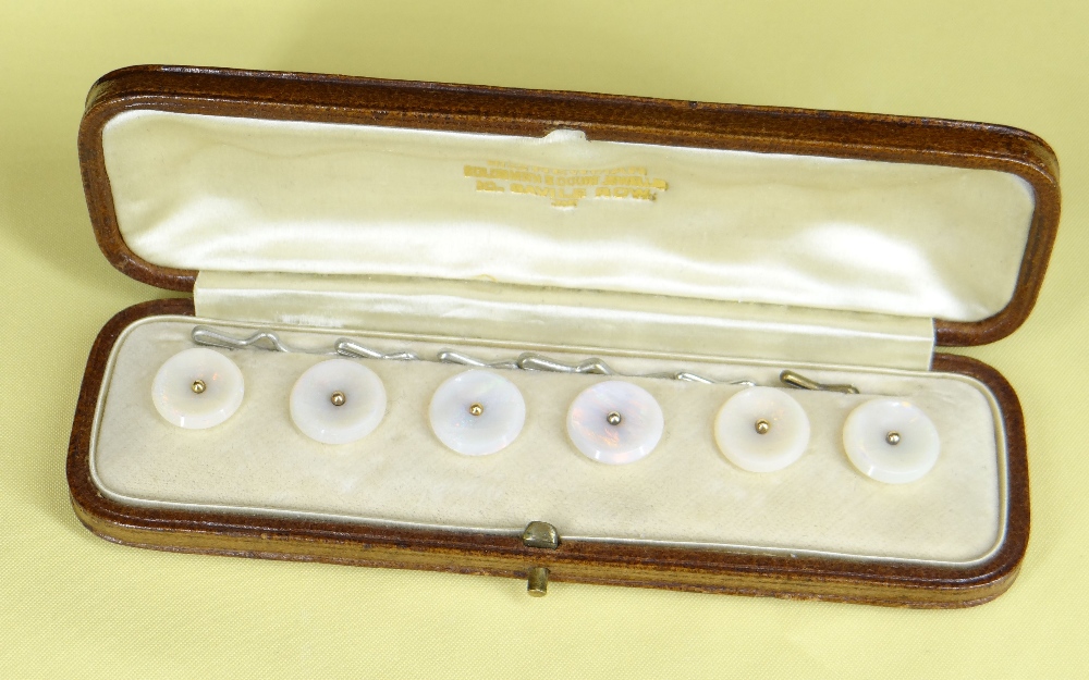 CASED SET OF SIX OPAL DRESS BUTTONS of circular shape in original vintage jewellery box marked '