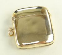 GEORGE V 9CT GOLD VESTA CASE, of slightly curved shape, Birmingham 1919, Deakin & Francis, 30.1gms