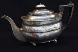 GEORGE III SILVER TEAPOT, London 1810, maker IB, oval form with floral engraved band and spout,