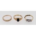 THREE GOLD RINGS comprising 18ct gold three stone diamond ring, gold diamond chip half eternity ring