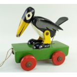 VINTAGE 1940's WOOD PULL ALONG CROW TOY, modelled after the characters from the Disney animated