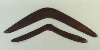 TWO AUSTRALIAN ABORIGINAL BOOMERANGS, one asymmetric with adzed faces, probably for bird-hunting,
