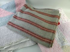 WELSH WOOLLEN NARROW LOOM BLANKET, 180 x 210cms; and two floral printed quilts, 146 x 180cms and 210