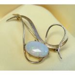 9CT GOLD OPAL BAR BROOCH of flowing loop design, the oval opal measuring 15 x 9mms, 3.9gms, in